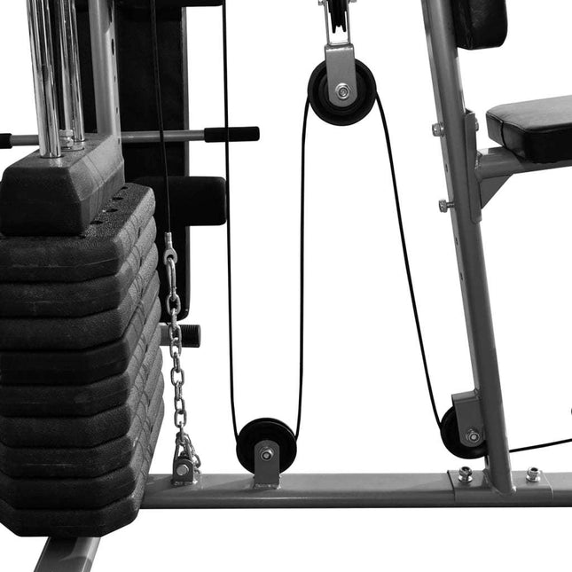 Close-up of vidaXL Multi-functional Home Gym 143.3lb weight stack and pulley system, showcasing durable construction for strength training.